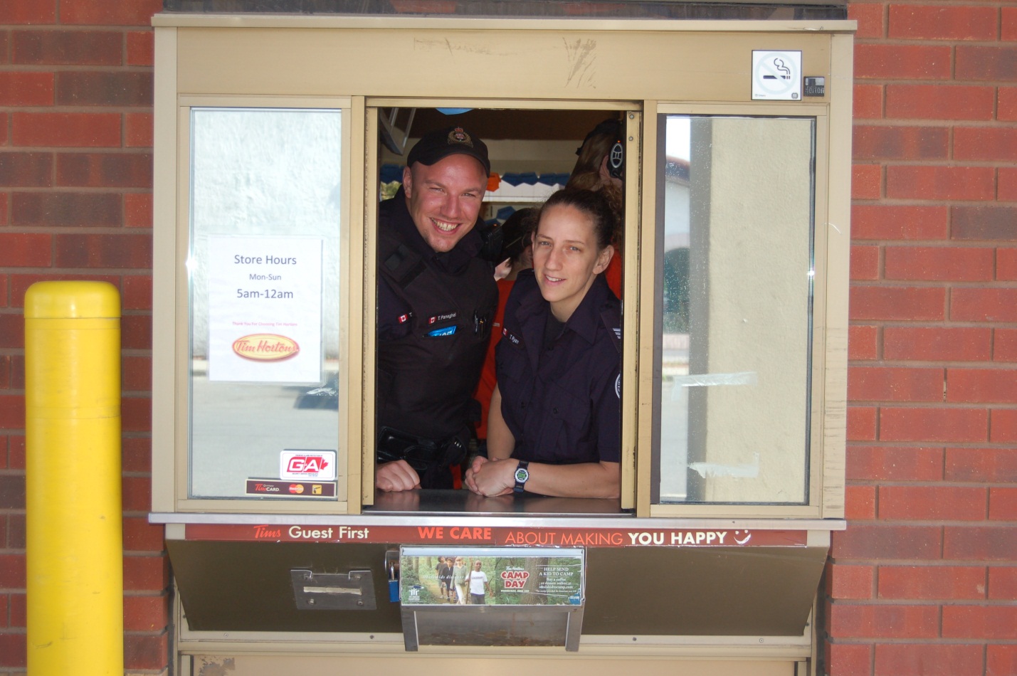 Two officers in a drive through window